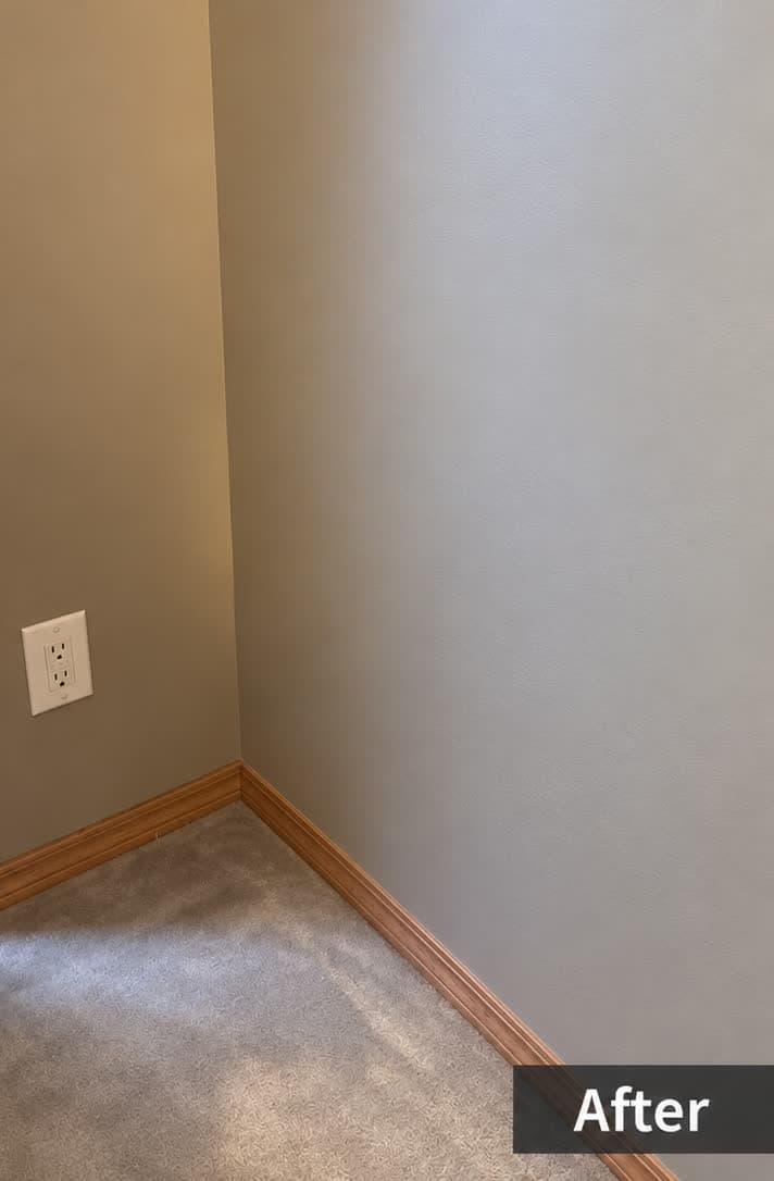 The same wall after drywall repair — patched and painted seamlessly — Calgary